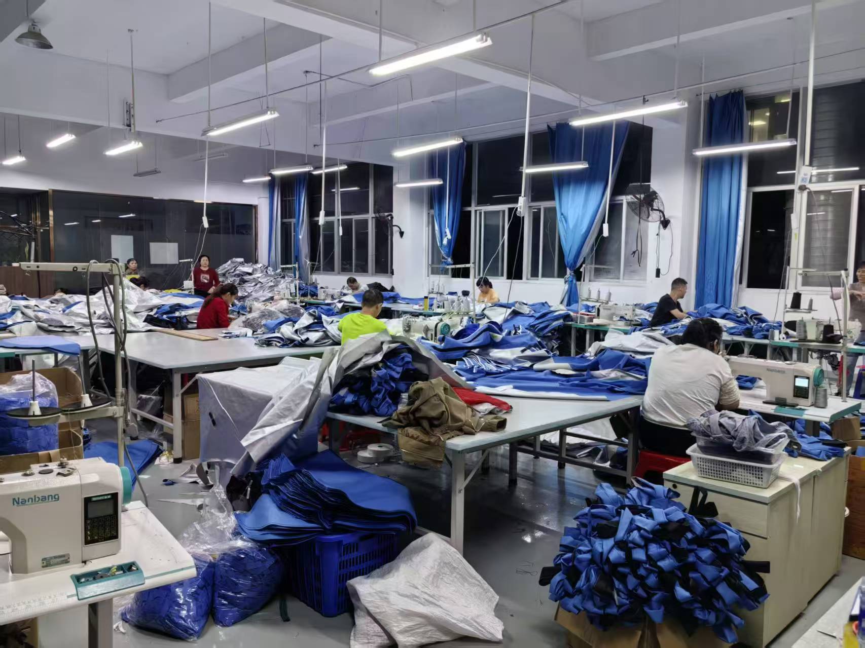 busy workshop in camping tent manufacturer 